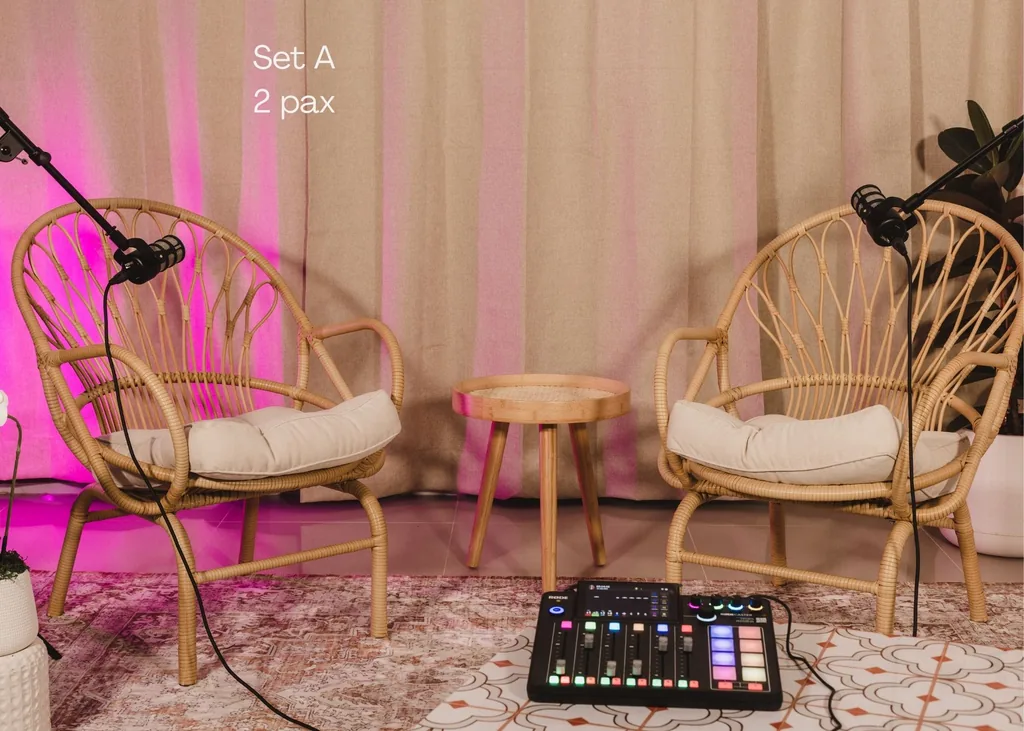 Set A: a pair of wicker chairs with microphones and warm curtains